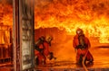 Firefighters fighting a fire,Firefighter training Royalty Free Stock Photo