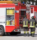 Firefighters and fire trucks during an emergency Royalty Free Stock Photo