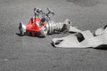 Firefighters hose and hydrant hose adaptor on concrete during a fire