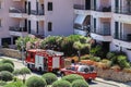 Firefighters intervene in an emergency by entering the balcony of an apartment