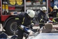 Firefighters with the pneumatic shears open the car doors Royalty Free Stock Photo