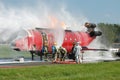 Firefighters practice extinguishing aircraft fire