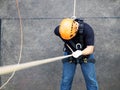 Firefighters are rappelling and climbing ropes