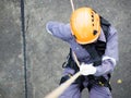 Firefighters are rappelling and climbing ropes