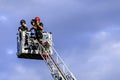 Firefighters on rear platform