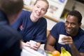 Firefighters relaxing in the staff kitchen Royalty Free Stock Photo