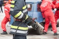 Firefighters in a rescue operation after road traffic accident Royalty Free Stock Photo