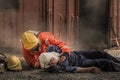 Firefighters save lives from fire making CPR Royalty Free Stock Photo