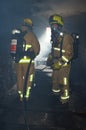 Firefighters in a smoke filled building