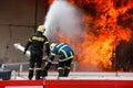 Firefighters struggle to extinguish the fire that broke out at a Royalty Free Stock Photo