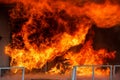 Firefighters struggle to extinguish the fire that broke out at a Royalty Free Stock Photo