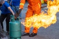 Firefighters teach company employees. How to extinguish a gas leak