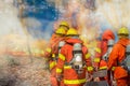 Firefighters team with equipment. Royalty Free Stock Photo