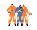 Firefighters team portrait. Men and woman fire fighters standing with firefighting tools. Happy people in uniform, 911