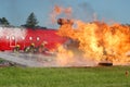 Firefighters training to fight fuel fire Royalty Free Stock Photo