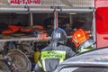 Firefighters in uniform at the fire truck with equipment. Employees of the Ministry of Emergency Situations of Russia