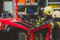 Firefighters using a hydraulic jaws of life Royalty Free Stock Photo