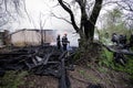 Firefighters using water hoses to extinguish a fire