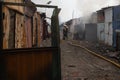 firefighters working to put out the fire caused by a Russian missile in a warehouse in Kharviv