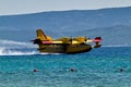 Firefighting aircraft landing for pick up water