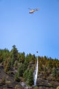 Firefighting plane over beautiful Coldstream Town in Scotland, fighting the Clerke road wildfire