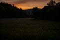 Fireflies Dot A Field At Sunset In Cades Cove Royalty Free Stock Photo