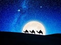 Silhouettes of three camels with riders traverse a sand dune under a night sky AI Royalty Free Stock Photo