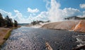 Firehole River flowing past the Midway Geyser Basin in Yellowstone National Park in Wyoming Royalty Free Stock Photo