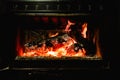 Firelogs burning in a fireplace in winter Royalty Free Stock Photo
