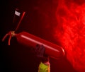 Fireman attacking a fire with extinguisher Royalty Free Stock Photo