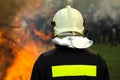 Fireman on the back of forest fire Royalty Free Stock Photo