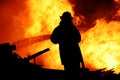 Fireman controlling a huge fire Royalty Free Stock Photo