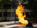 Fireman demonstrates how to suppress fire from gas tanks