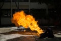 Fireman demonstrates how to suppress fire from gas tanks