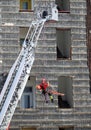 Fireman during an exercise carries the stretcher with the rope Royalty Free Stock Photo