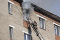 Fireman extinguish a fire in apartment