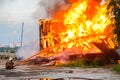 Fireman extinguishes a burning house