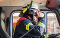 Fireman in a fire truck drived and spark with radios set Royalty Free Stock Photo