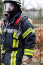 Fireman with fireproof clothing and respirator