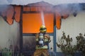 Fireman at a House Fire