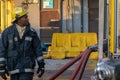 Fireman and rescue firefighters combating a building fire