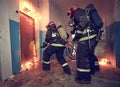 Firemans team during firefighting