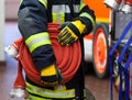 A Fireman with water hose Royalty Free Stock Photo