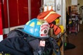 Firemans helmet lies by fire engine in fire station Royalty Free Stock Photo