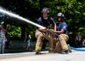 Firemen Aim Hose At Target In Atlanta Muster Competition