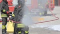 firemen with the fire extinguisher during a practice session Royalty Free Stock Photo