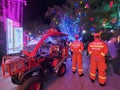 Firemen are holding their posts at the scene of the Huizhou West Lake Lantern Festival.