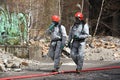 Firemen in light protective suit