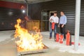 Firemen performing controlled fire training Royalty Free Stock Photo