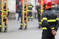 Firemen during rescue operations with a wooden ladder Royalty Free Stock Photo